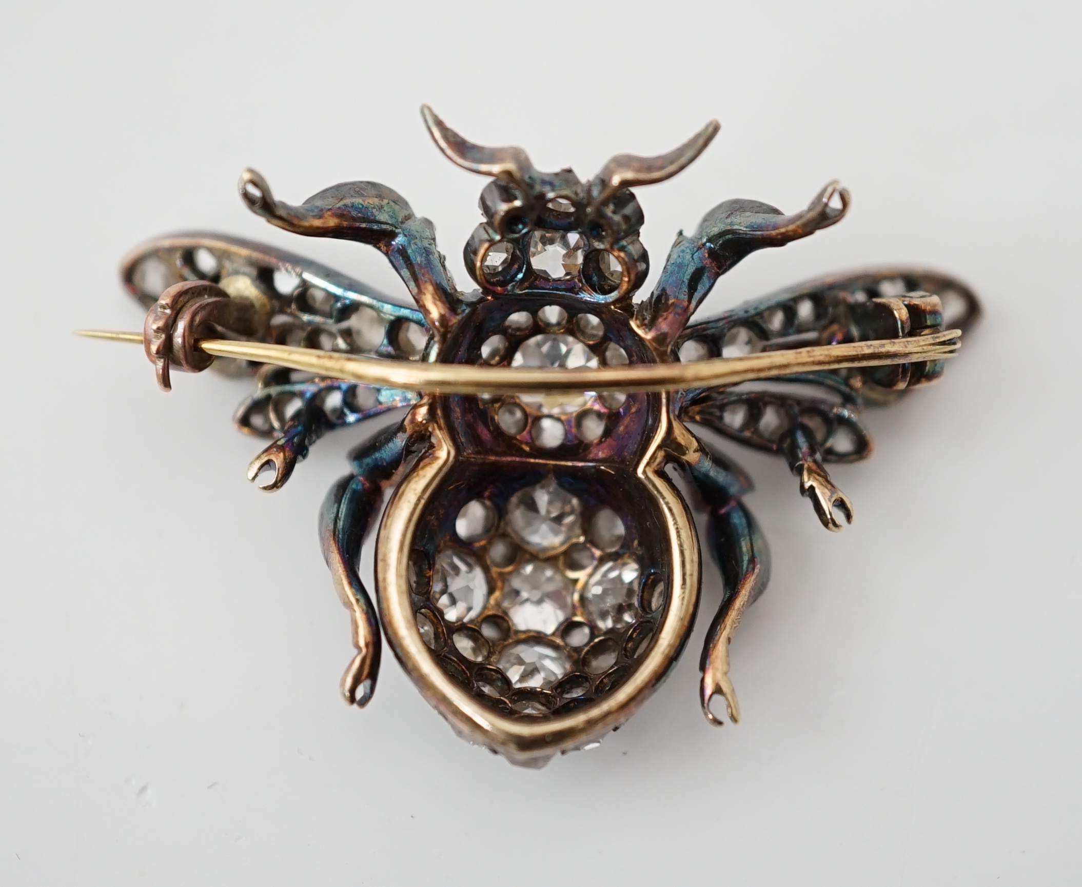 A Victorian gold, silver and diamond encrusted bee brooch